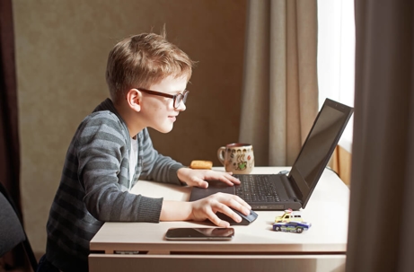 Kid on computer